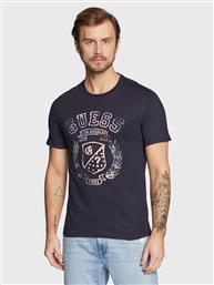 T-SHIRT M3RI03 I3Z14 ΣΚΟΥΡΟ ΜΠΛΕ SLIM FIT GUESS από το MODIVO